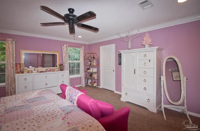 a bathroom with a sink vanity and mirror