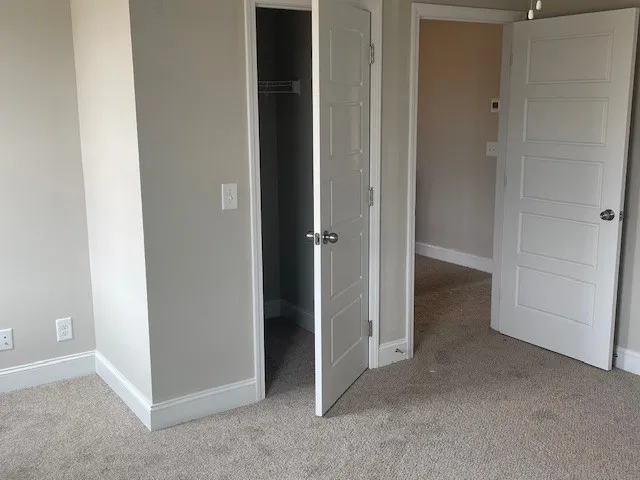 an empty room with closet