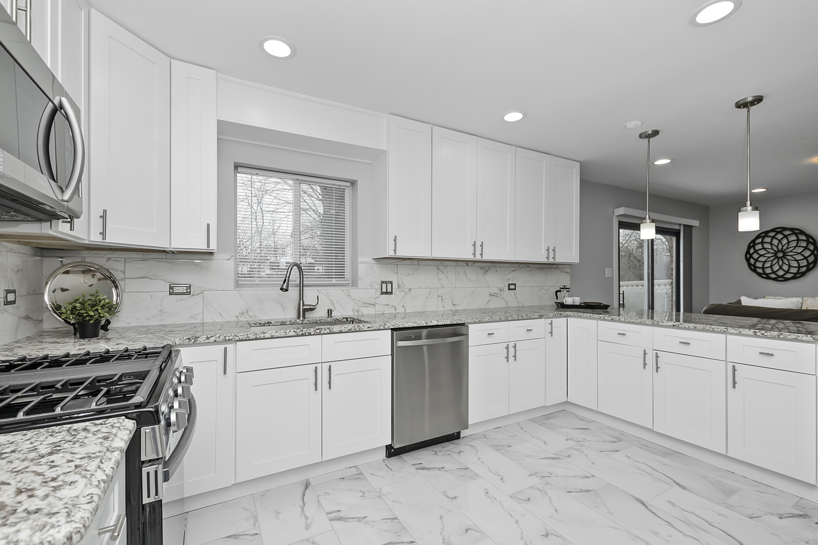 2907 Willow Road Homewood, IL 60430 - Photo 4 of 21 a kitchen with granite countertop white cabinets and white appliances
