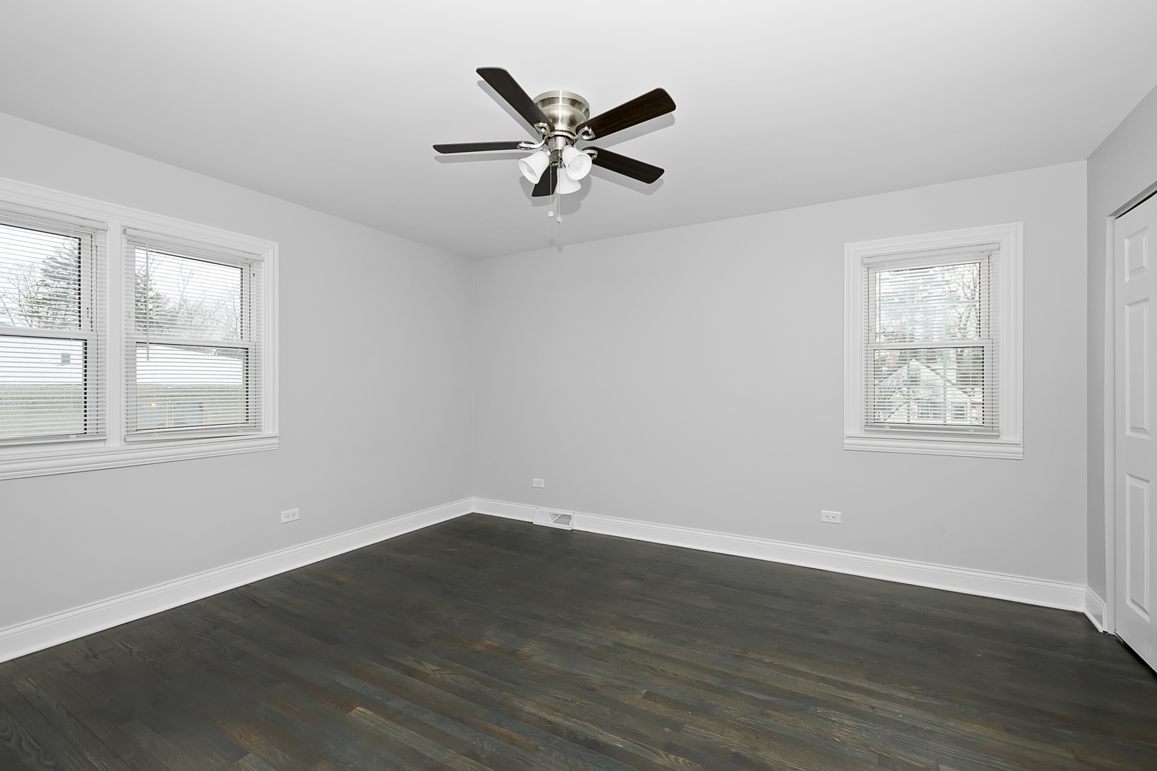2907 Willow Road Homewood, IL 60430 - Photo 6 of 21 a view of wooden floor and a chandelier fan in a room