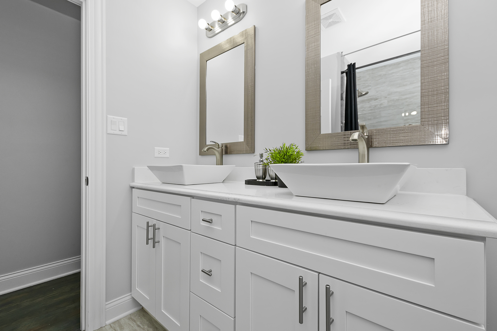 2907 Willow Road Homewood, IL 60430 - Photo 8 of 21 a bathroom with a sink vanity and mirror