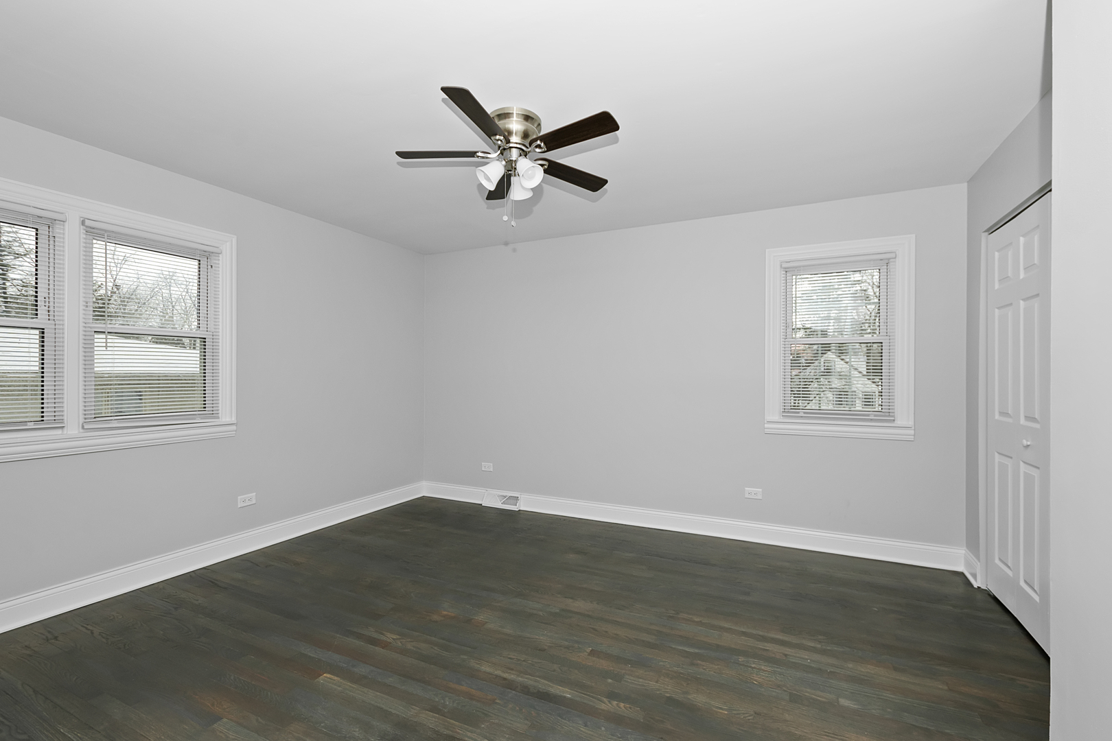 2907 Willow Road Homewood, IL 60430 - Photo 10 of 21 a view of a room with wooden floor and windows