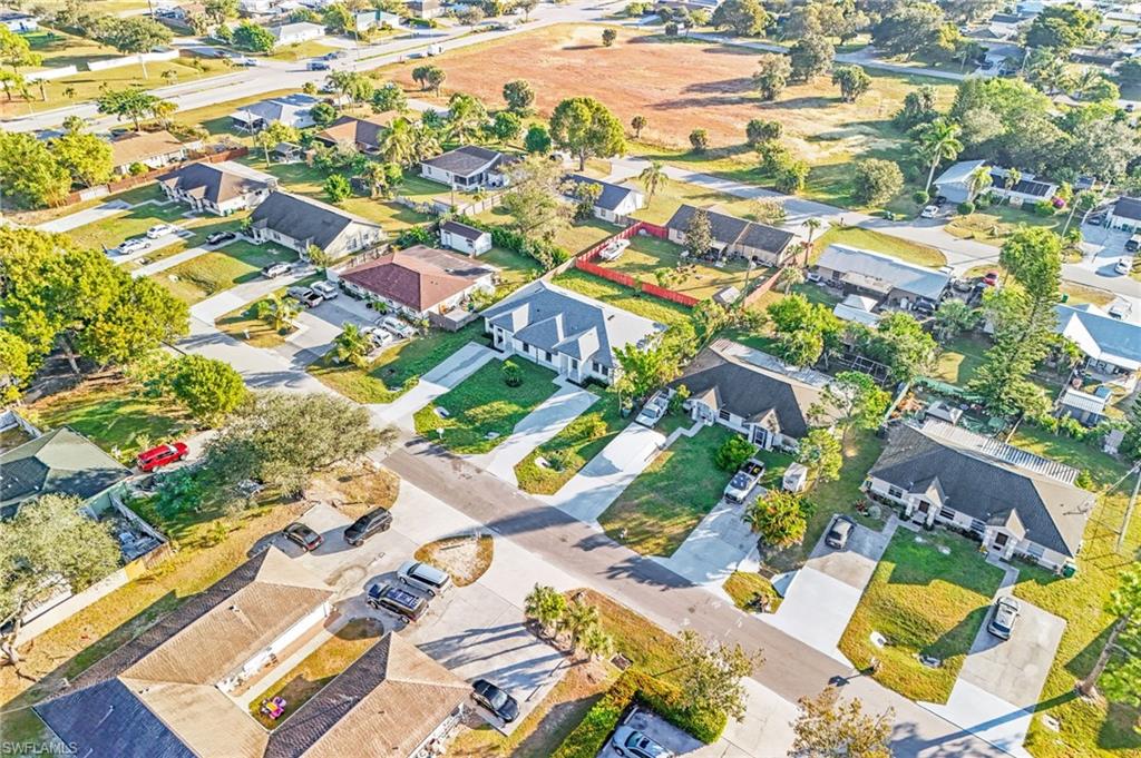 2064 55th Terrace Southwest Naples, FL 34116 - Photo 30 of 30 Aerial view of property and surrounding area featuring nearby suburban area