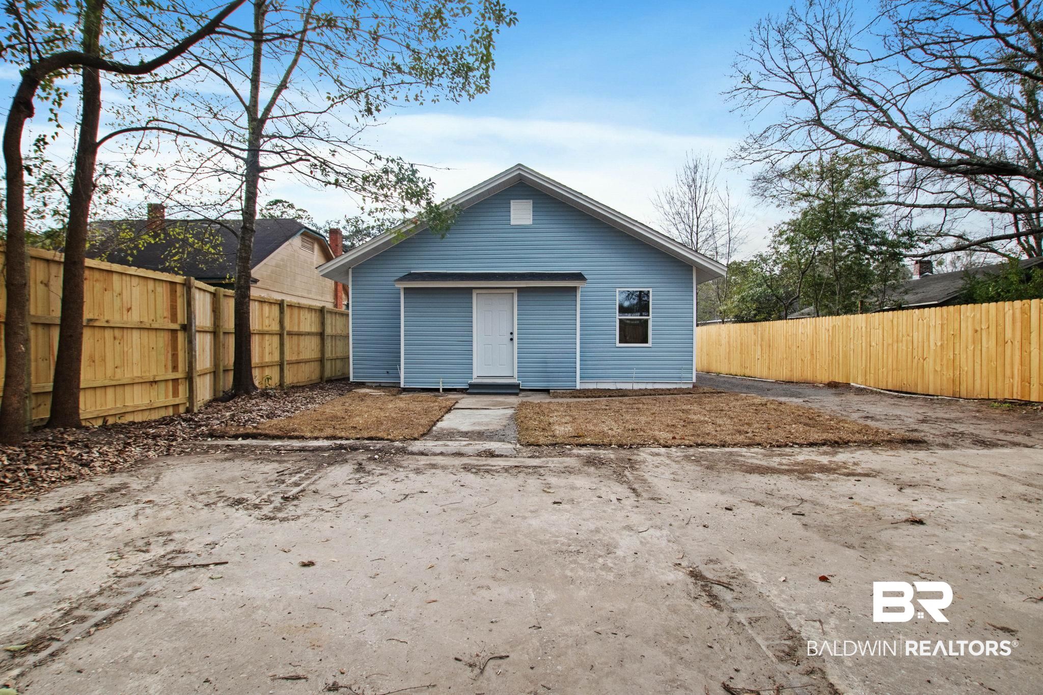 128 Bush Avenue Mobile, AL 36604 - Photo 35 of 40 Rear view of property featuring a fenced backyard