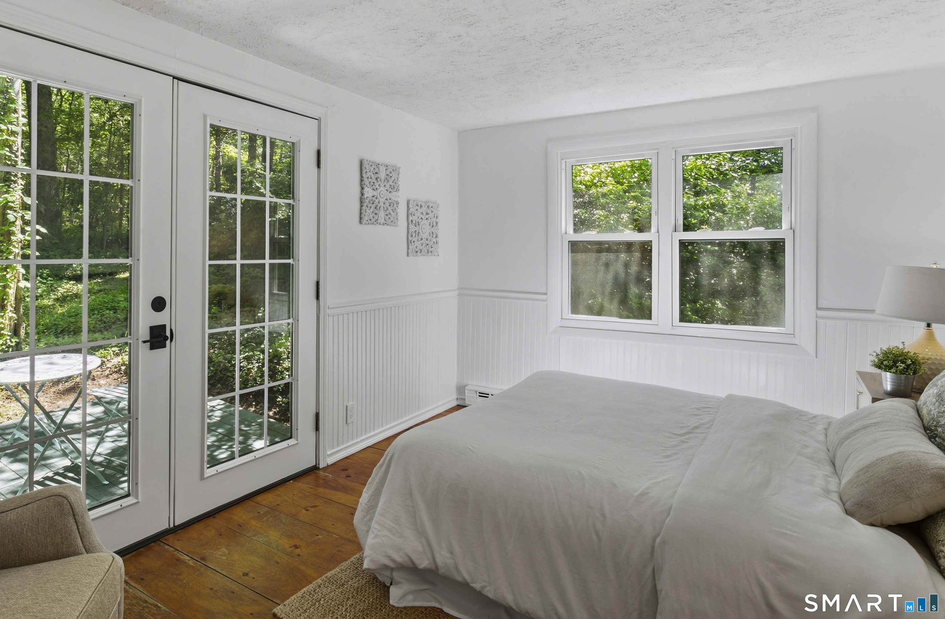 188 Bacon Road Roxbury, CT 06783 - Photo 12 of 33 a bedroom with a bed and a large window