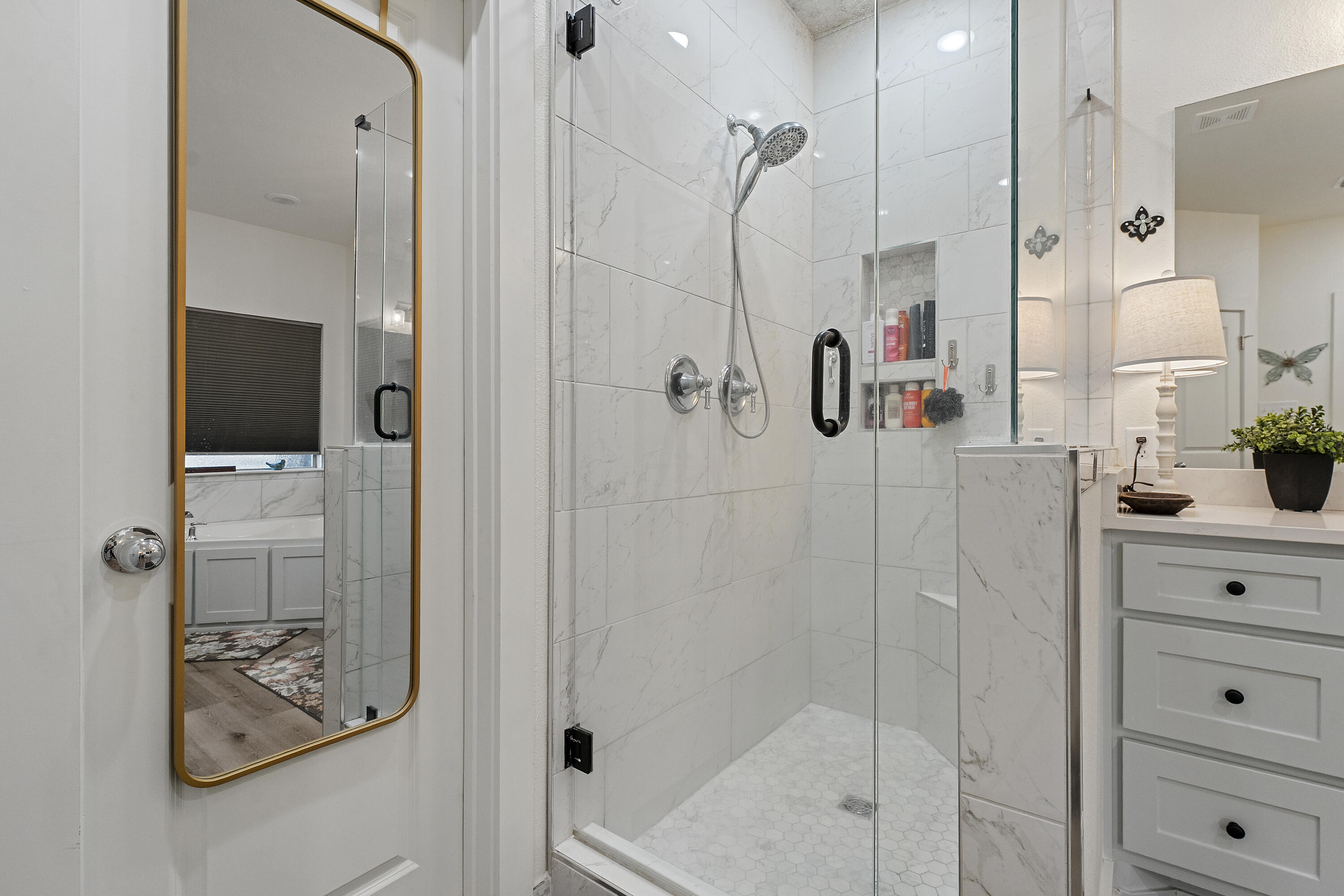 3613 County Road 7660 Lubbock, TX 79423 - Photo 21 of 41 a bathroom with a shower and a sink