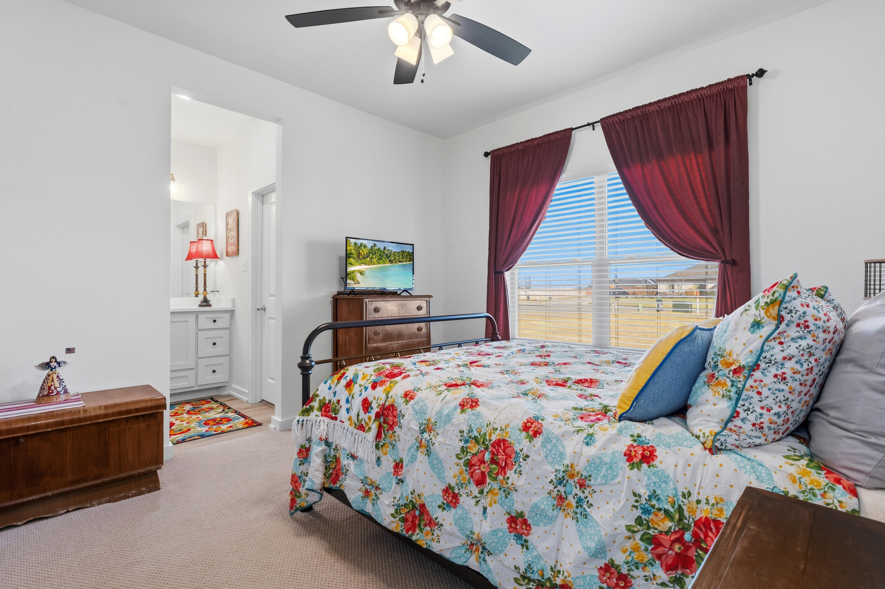 3613 County Road 7660 Lubbock, TX 79423 - Photo 23 of 41 a bedroom with a bed and a window