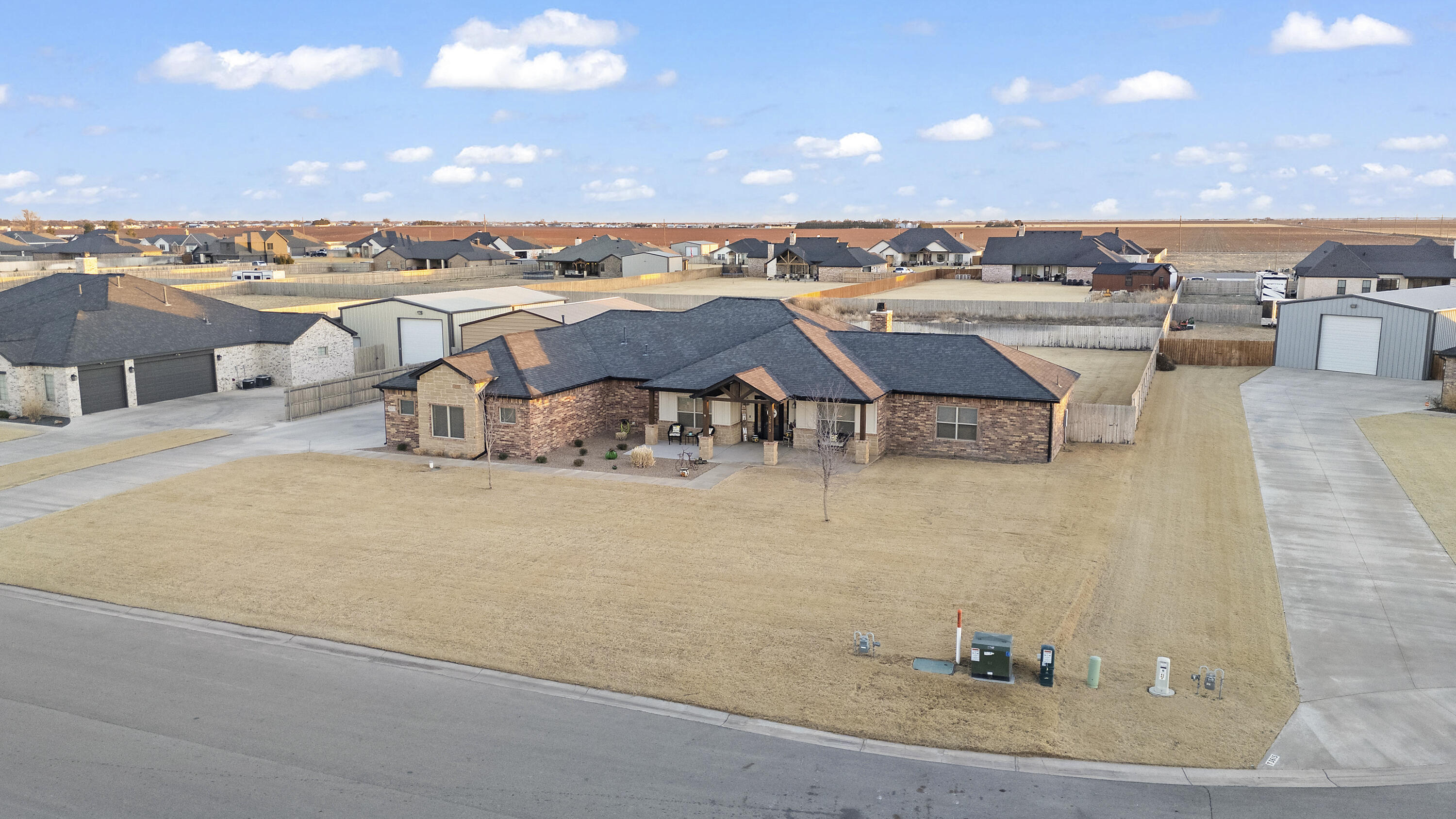 3613 County Road 7660 Lubbock, TX 79423 - Photo 3 of 41 a view of a terrace with lawn chairs