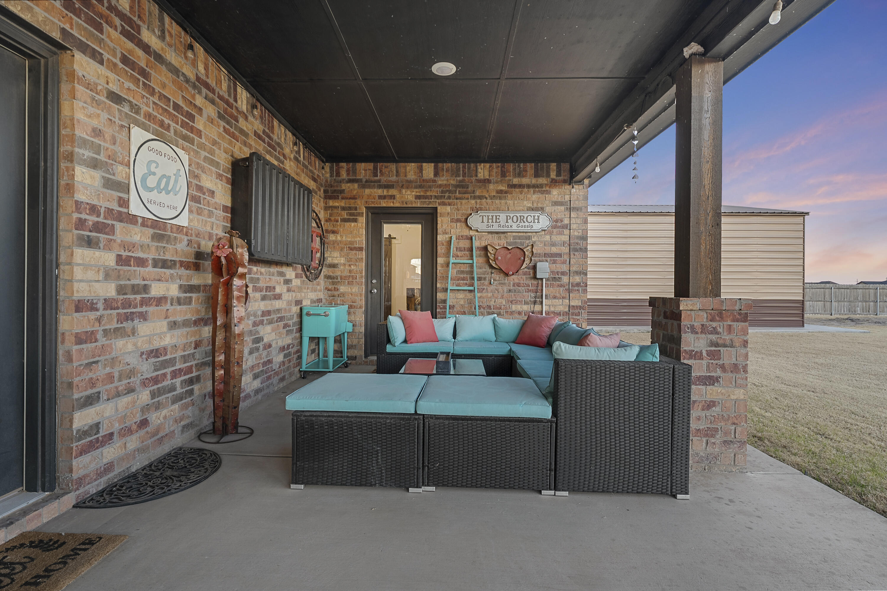 3613 County Road 7660 Lubbock, TX 79423 - Photo 32 of 41 a living room with furniture and a fireplace
