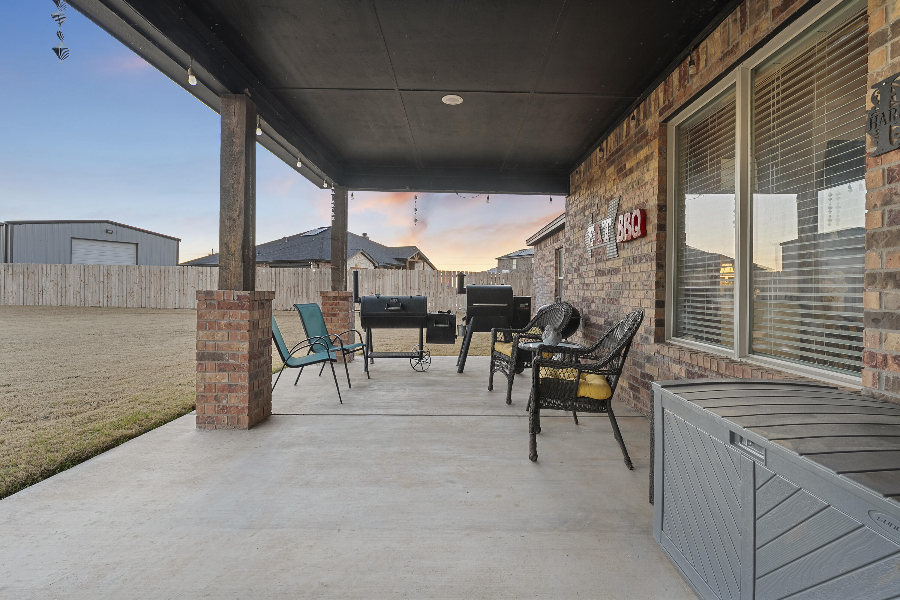 3613 County Road 7660 Lubbock, TX 79423 - Photo 33 of 41 a patio with table and chairs