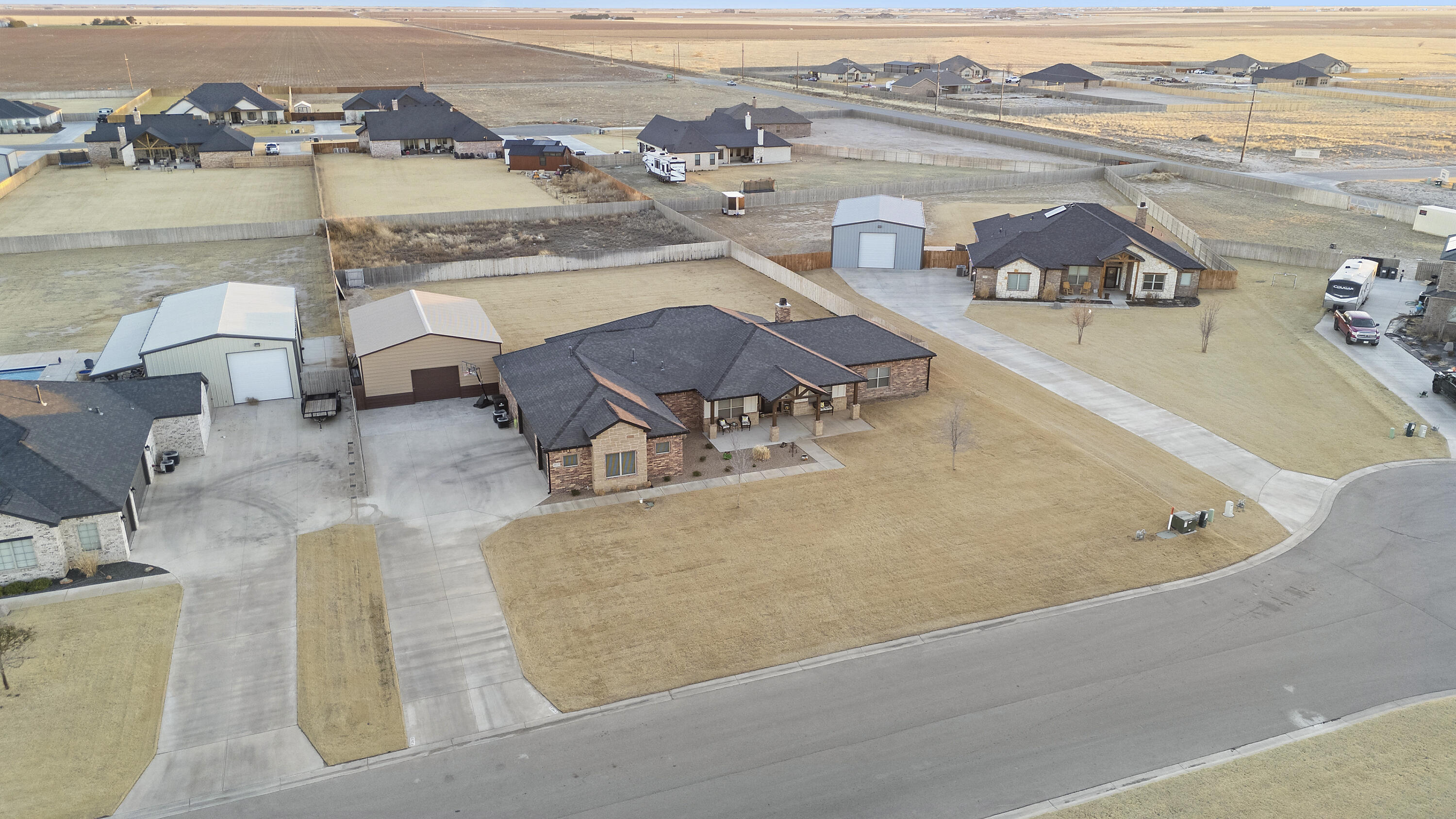 3613 County Road 7660 Lubbock, TX 79423 - Photo 41 of 41 an aerial view of a house with outdoor space and ocean view