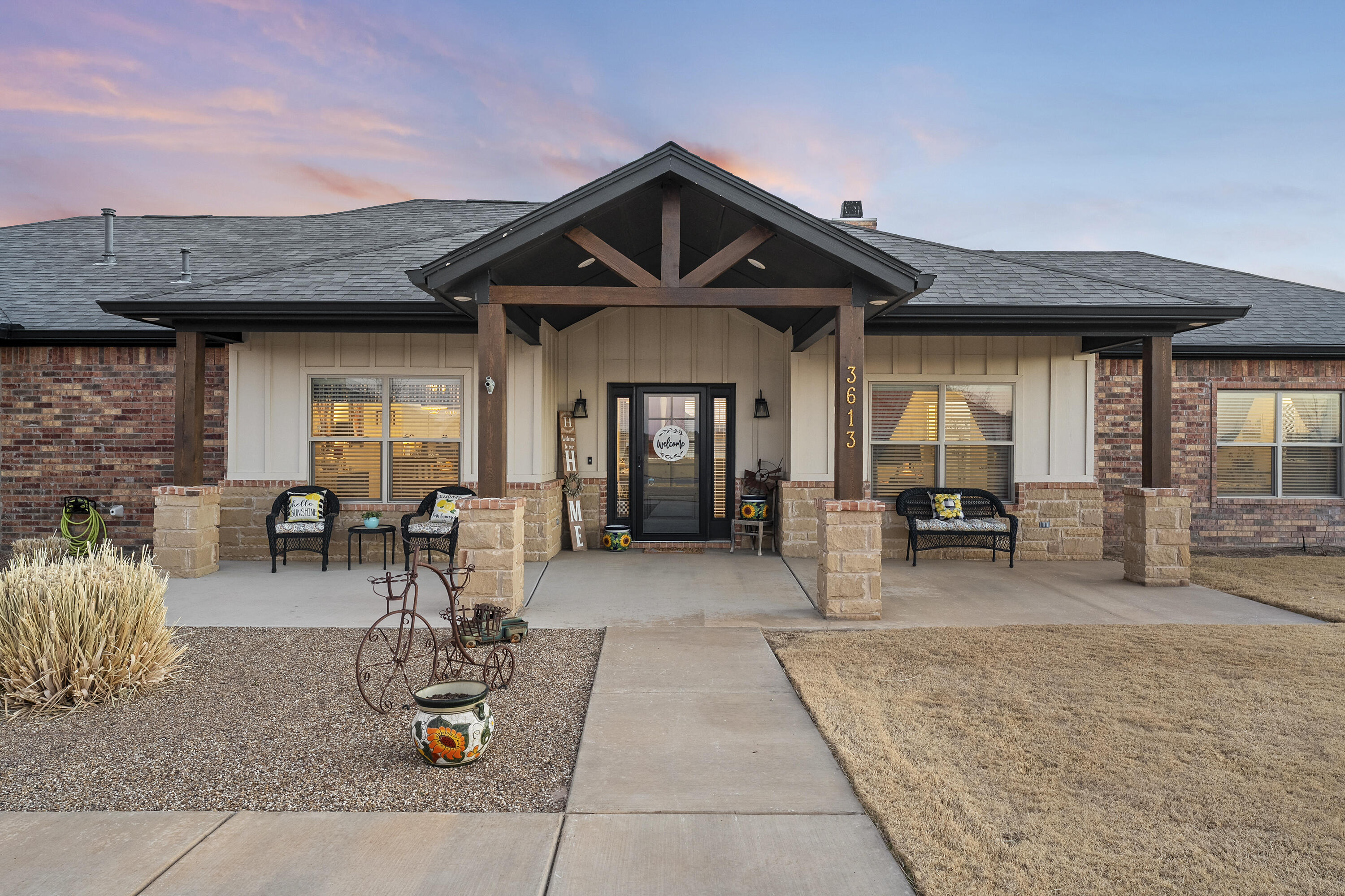 3613 County Road 7660 Lubbock, TX 79423 - Photo 5 of 41 a front view of house with outdoor seating