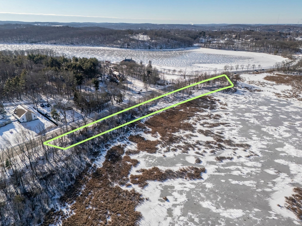 90 Amesbury Road Haverhill, MA 01830 - Photo 2 of 16 a view of a yard with an outdoor space and seating