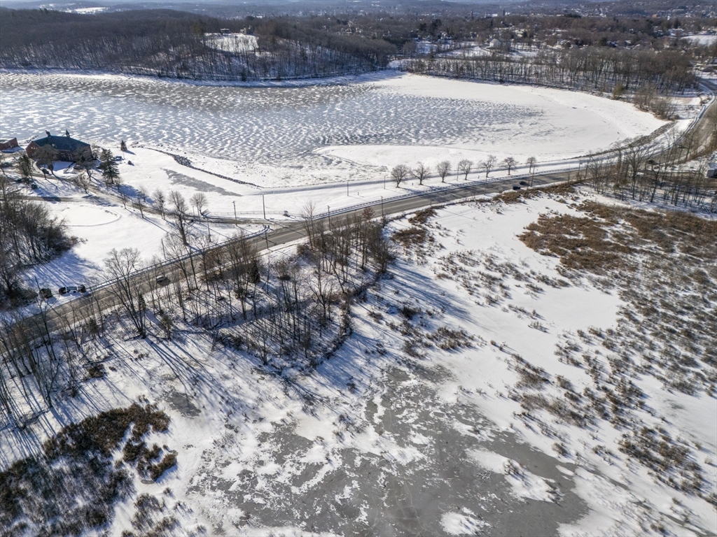 90 Amesbury Road Haverhill, MA 01830 - Photo 10 of 16 a view of water heater and covered with wooden fence