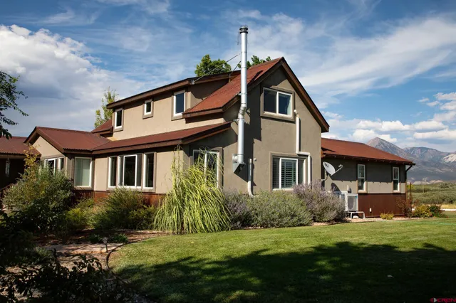 a house view with a garden space
