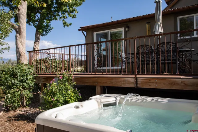 a view of a chairs setting on the deck