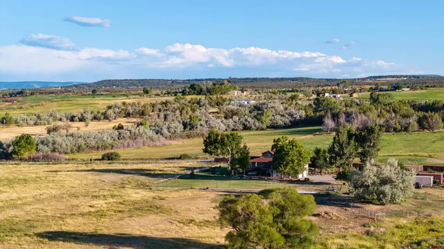 a view of an ocean and a mountain
