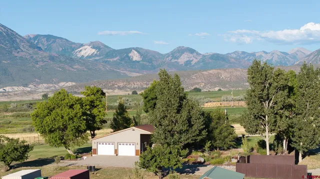 a view of a city with a mountain in the background