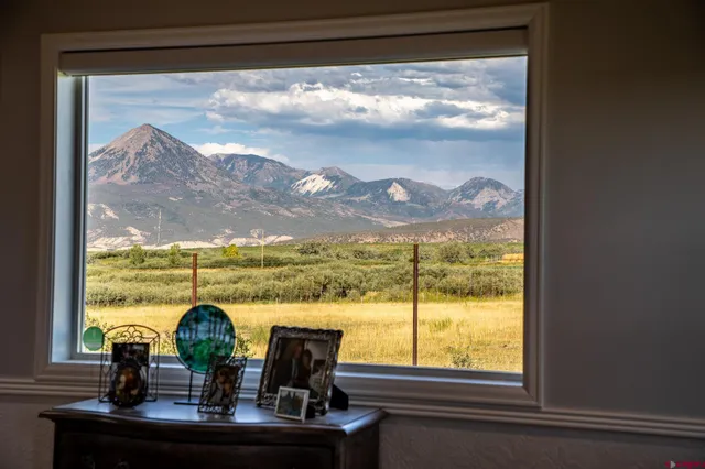 a view of a lake from a window