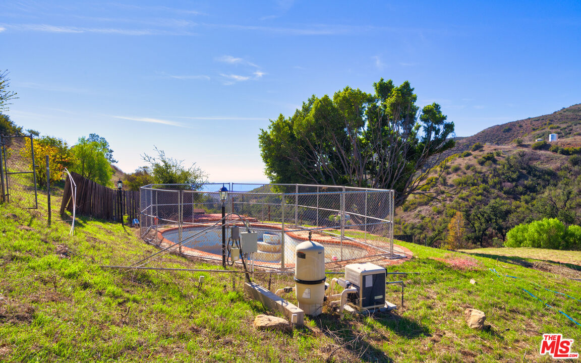 3450 Decker Road Malibu, CA 90265 - Photo 14 of 21 a view of a backyard with sitting area