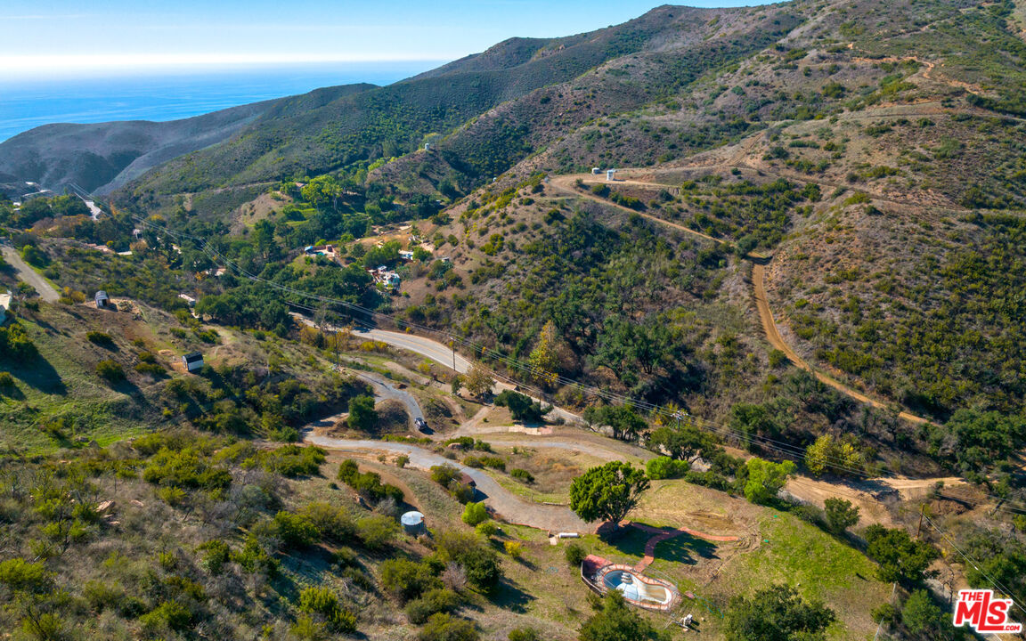 3450 Decker Road Malibu, CA 90265 - Photo 20 of 21 a view of a houses with a yard