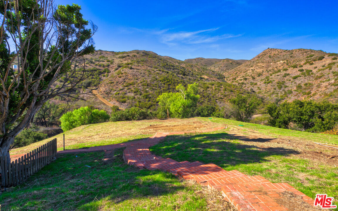 3450 Decker Road Malibu, CA 90265 - Photo 2 of 21 a view of a field with an ocean