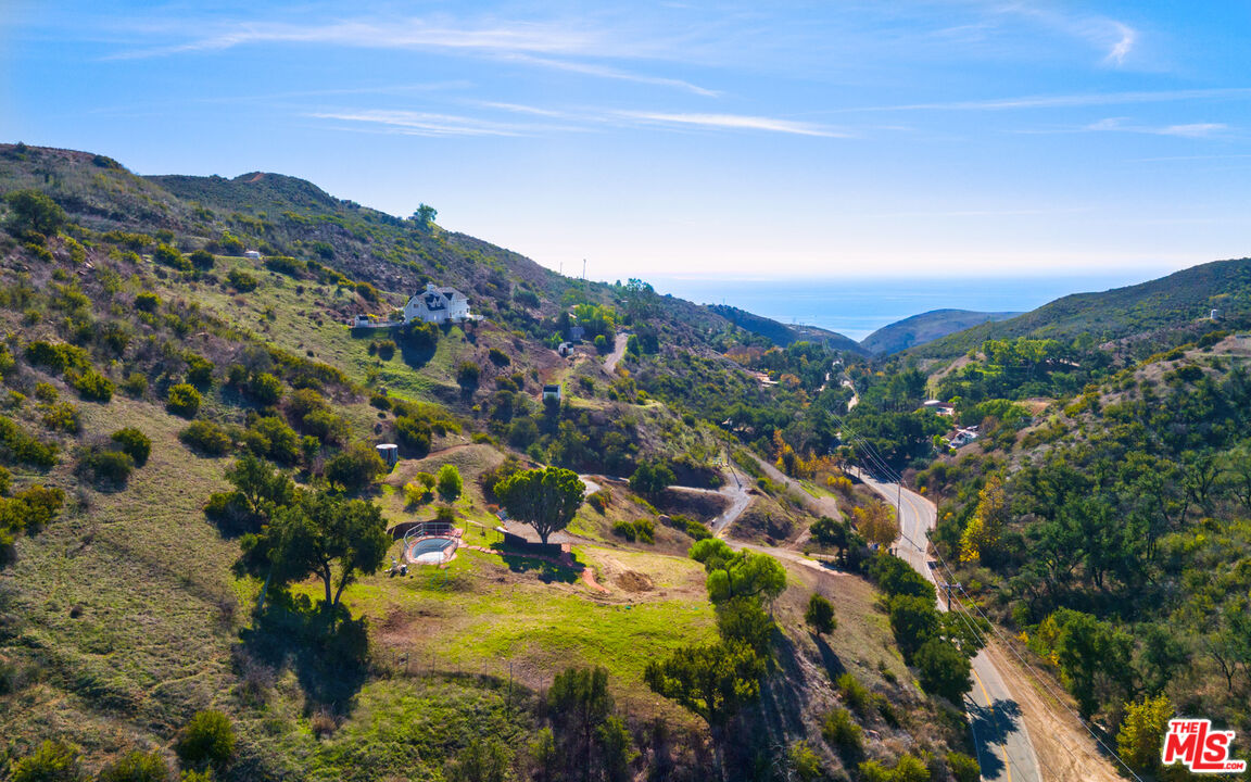3450 Decker Road Malibu, CA 90265 - Photo 5 of 21 a view of a city with mountains in the background