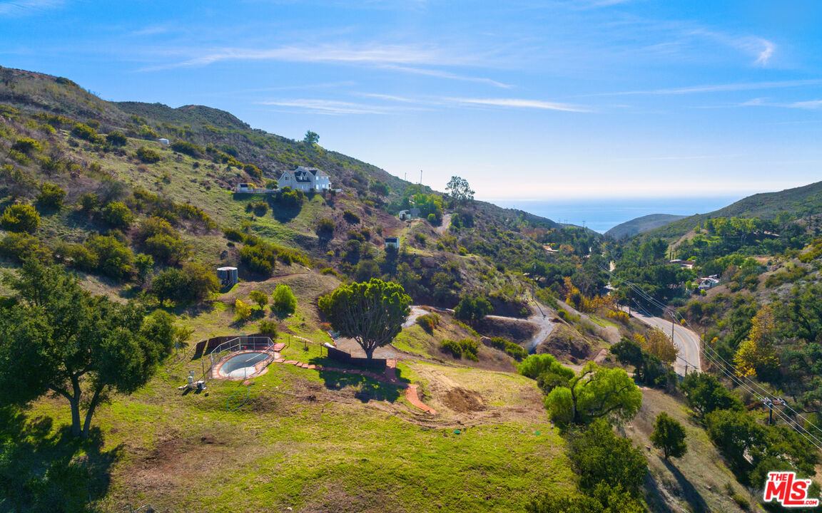 3450 Decker Road Malibu, CA 90265 - Photo 6 of 21 an aerial view of residential houses with outdoor space
