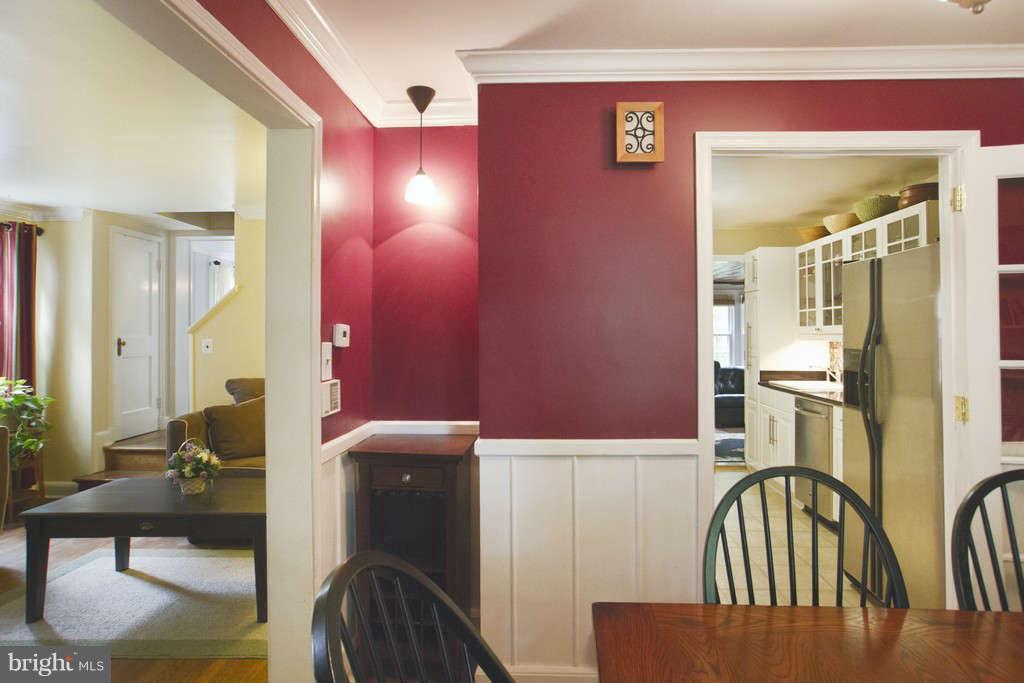 906 Adana Road Baltimore, MD 21208 - Photo 14 of 30 Dining room opens to kitchen and living room