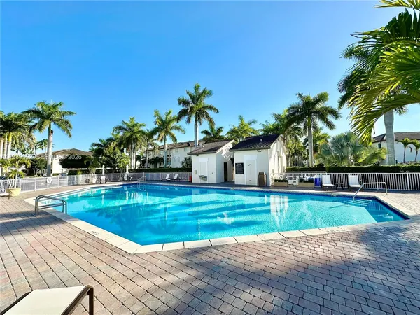 a view of a house with swimming pool
