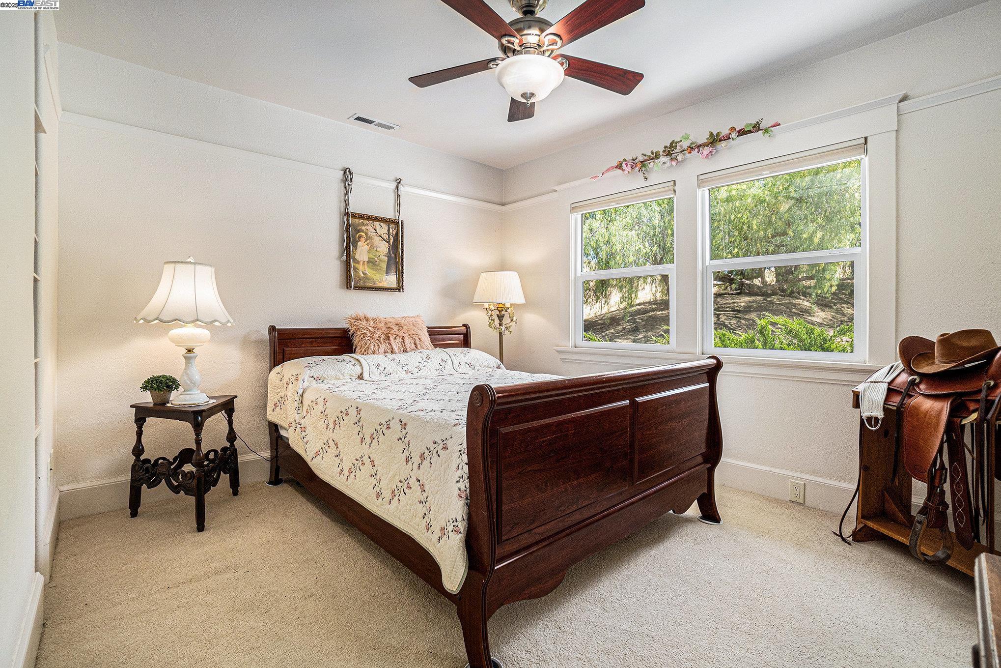 5799 Nortonville Road Pittsburg, CA 94565 - Photo 27 of 59 a bedroom with a bed and a window