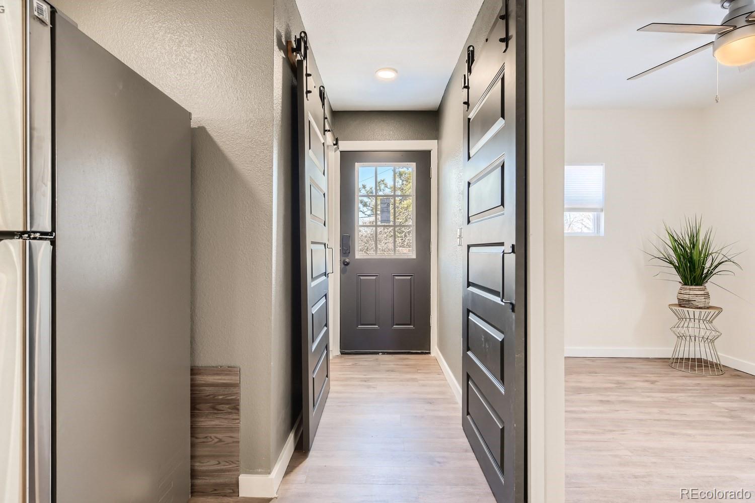 7770 South Kit Carson Drive Centennial, CO 80122 - Photo 18 of 30 a view of a hallway