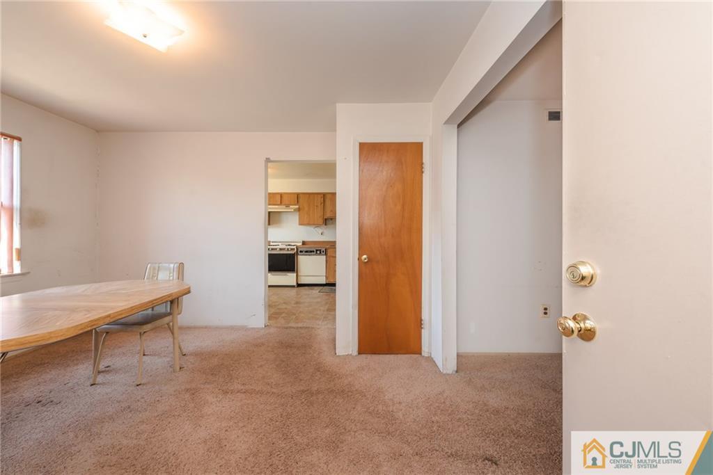 1915 Raspberry Court, Unit 1915 Edison, NJ 08817 - Photo 2 of 18 a view of workspace with wooden floor and windows