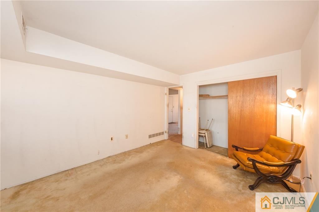 1915 Raspberry Court, Unit 1915 Edison, NJ 08817 - Photo 11 of 18 a view of a room with gym equipment