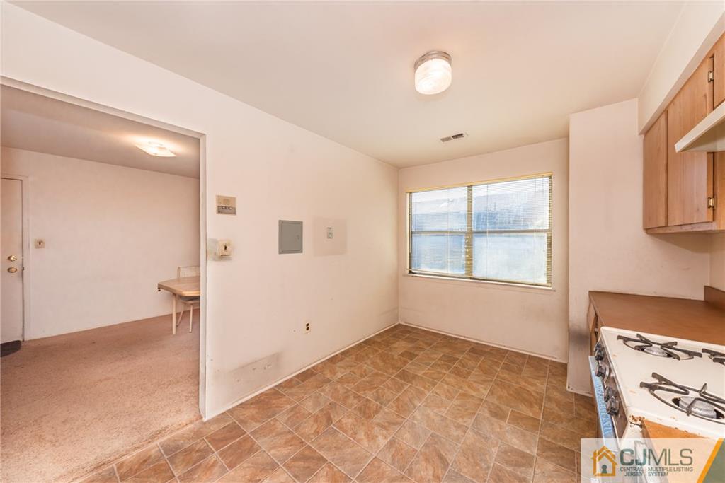 1915 Raspberry Court, Unit 1915 Edison, NJ 08817 - Photo 16 of 18 a view of an empty room with a window