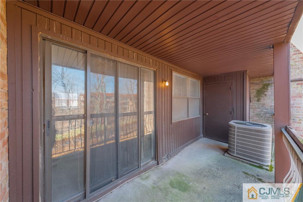 1915 Raspberry Court, Unit 1915 Edison, NJ 08817 - Photo 17 of 18 a view of room with front door