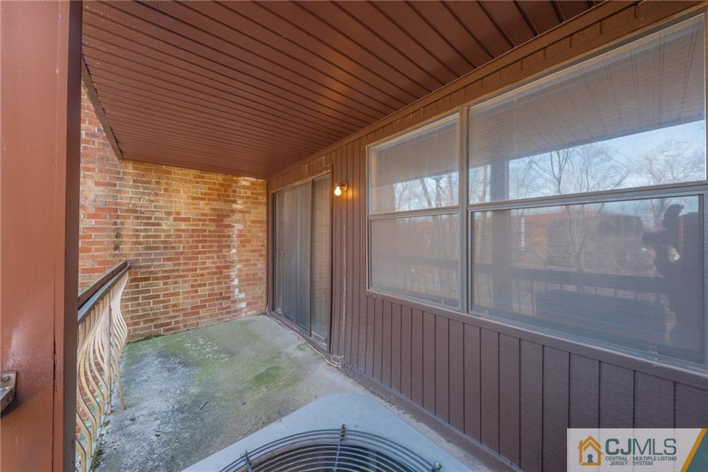 1915 Raspberry Court, Unit 1915 Edison, NJ 08817 - Photo 18 of 18 a view of outdoor space with wooden deck