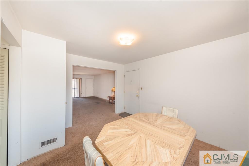 1915 Raspberry Court, Unit 1915 Edison, NJ 08817 - Photo 4 of 18 a room with a bed and pillows