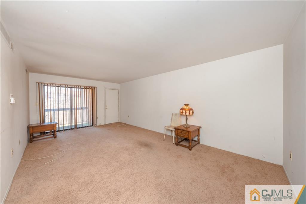 1915 Raspberry Court, Unit 1915 Edison, NJ 08817 - Photo 6 of 18 a room with a window