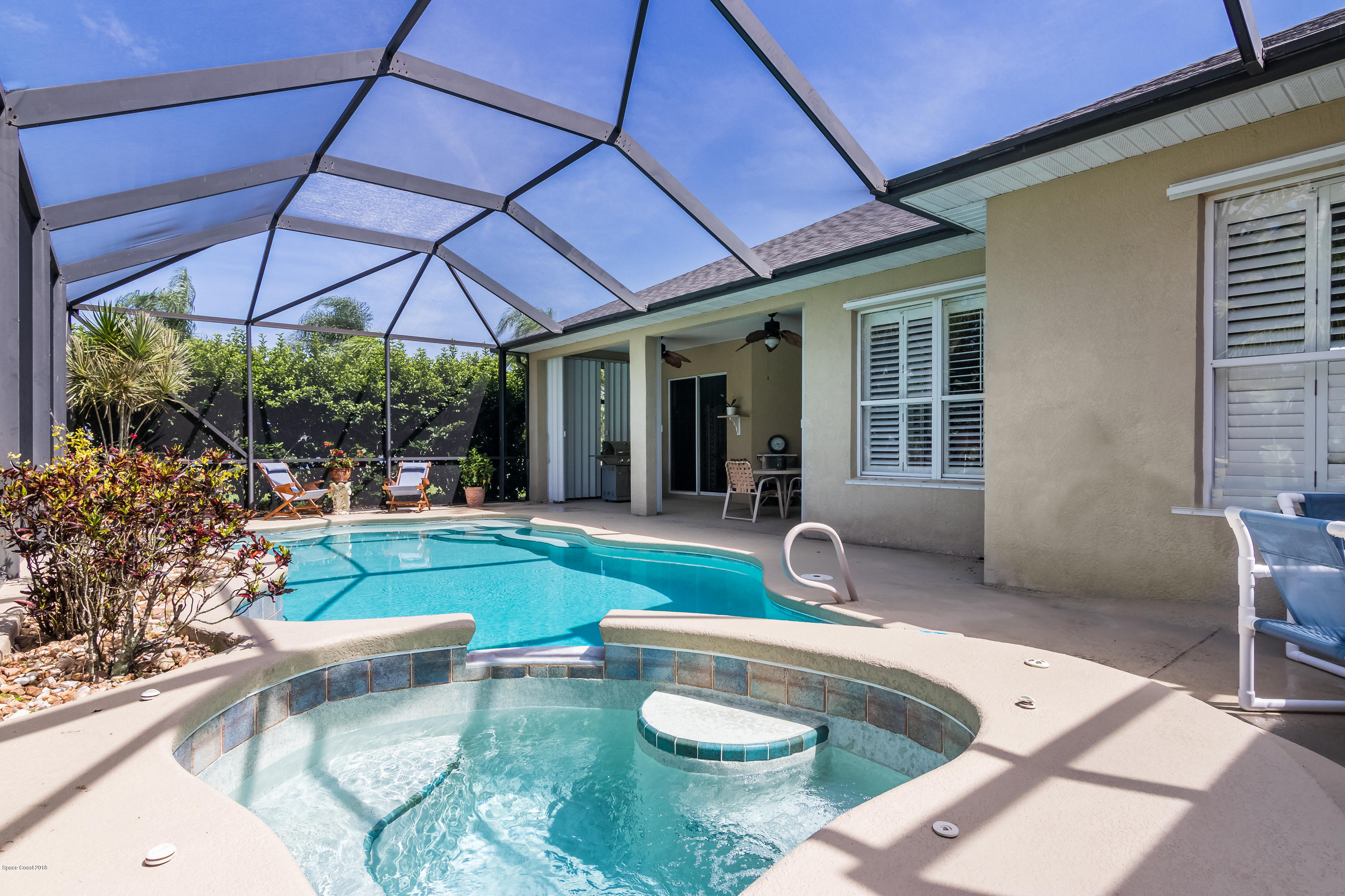 1602 Long Pine Road Melbourne, FL 32940 - Photo 21 of 28 a house view with a sitting space and garden view