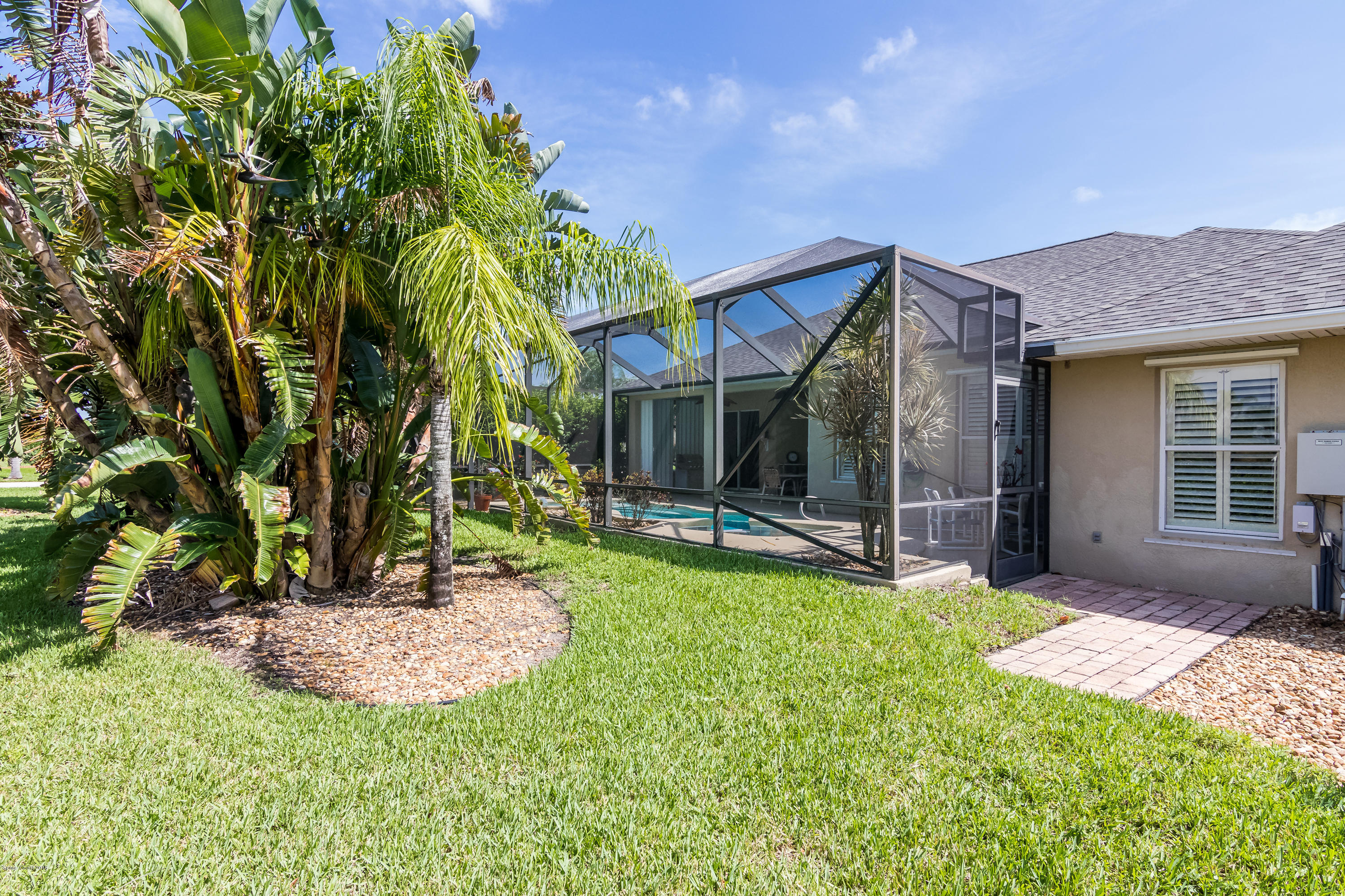 1602 Long Pine Road Melbourne, FL 32940 - Photo 27 of 28 a view of a house with a yard porch and sitting area