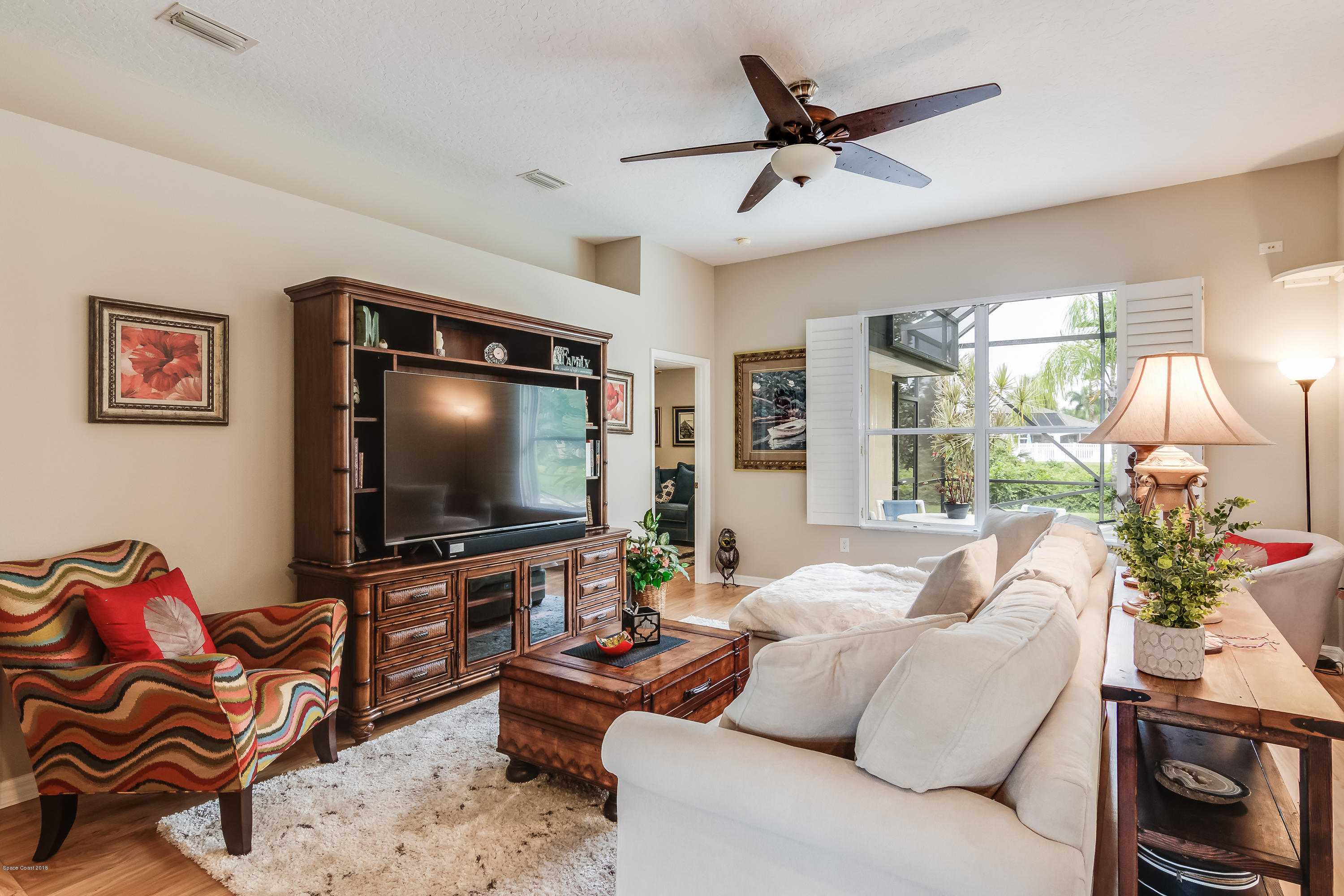 1602 Long Pine Road Melbourne, FL 32940 - Photo 10 of 28 a living room with furniture and a flat screen tv