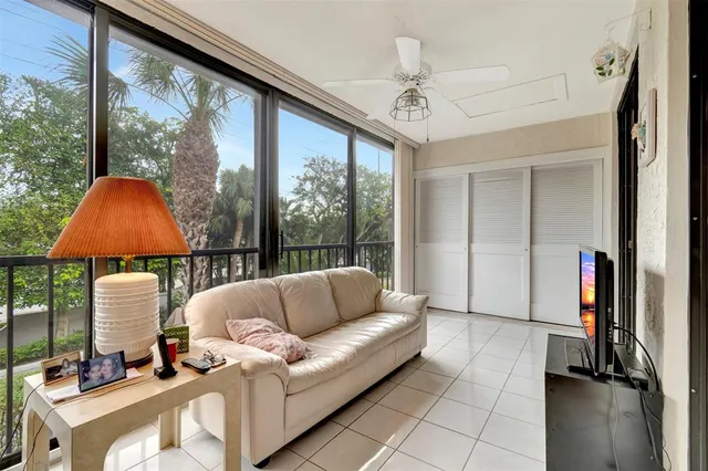 a view of a lake with houses in the back