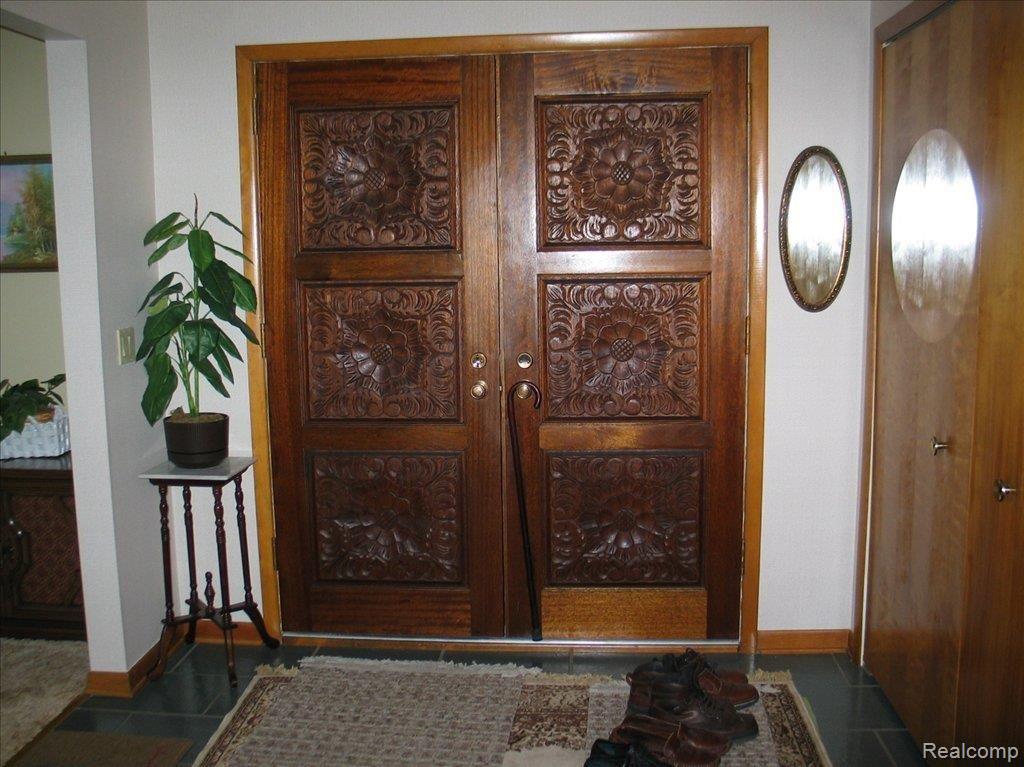 3336 Musson Road Howell, MI 48855 - Photo 16 of 21 Carved Mahogany Door
