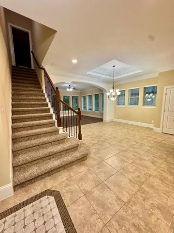a view of entryway with a front door