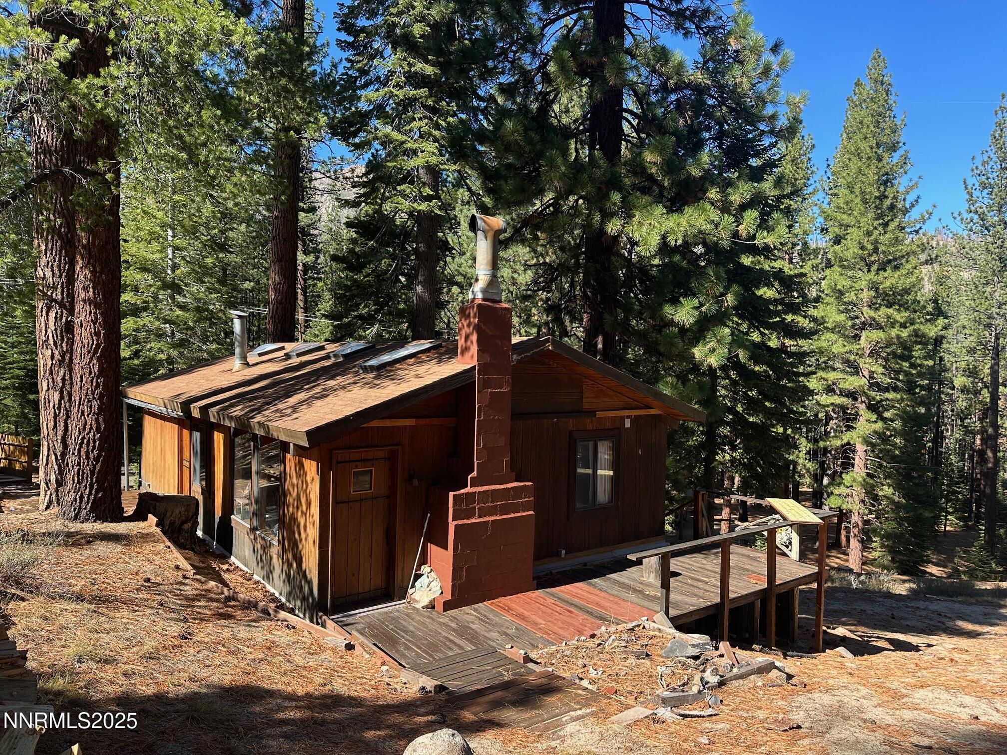 201 Shay Creek Road Markleeville, CA 96120 - Photo 2 of 35 a view of a house with a yard