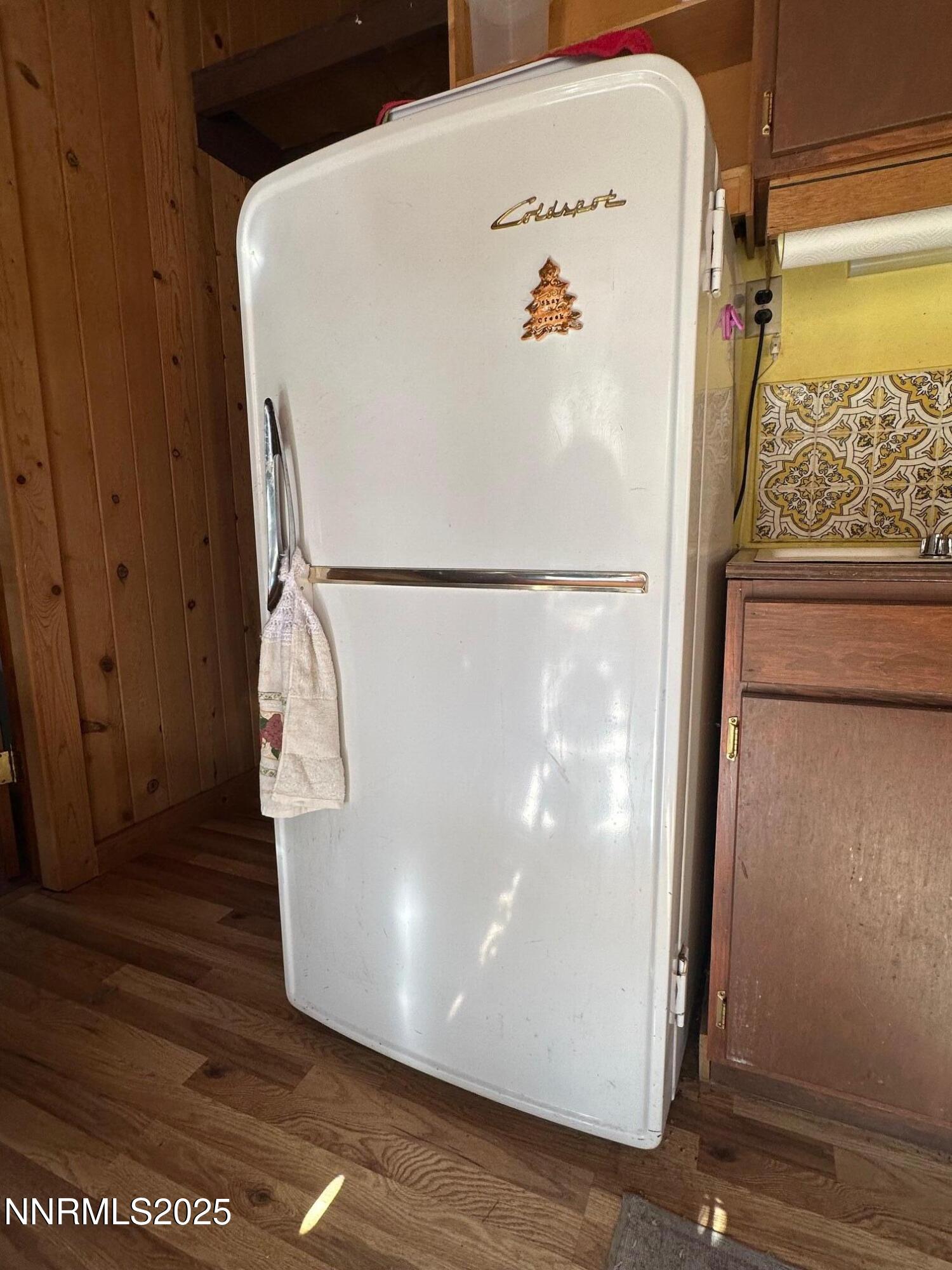 201 Shay Creek Road Markleeville, CA 96120 - Photo 21 of 35 a white refrigerator freezer sitting in a kitchen