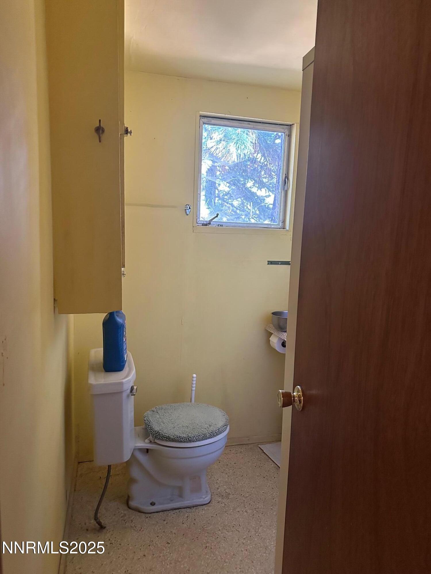 201 Shay Creek Road Markleeville, CA 96120 - Photo 26 of 35 a white toilet sitting next to a bathroom sink