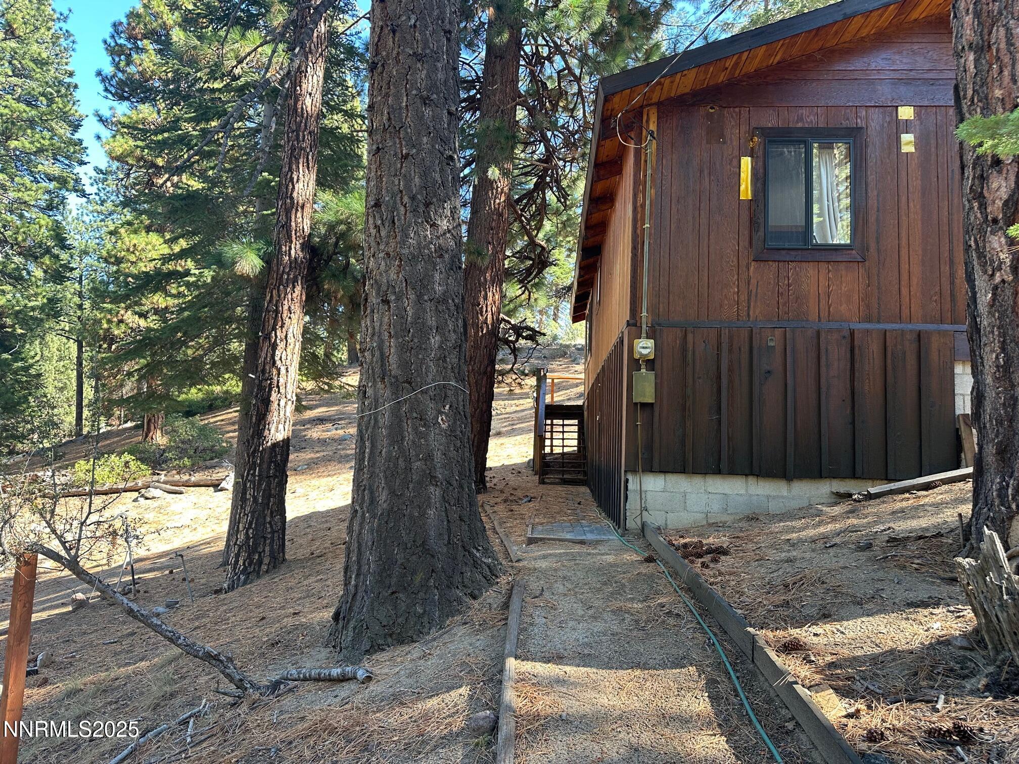 201 Shay Creek Road Markleeville, CA 96120 - Photo 3 of 35 a view of a house with a tree