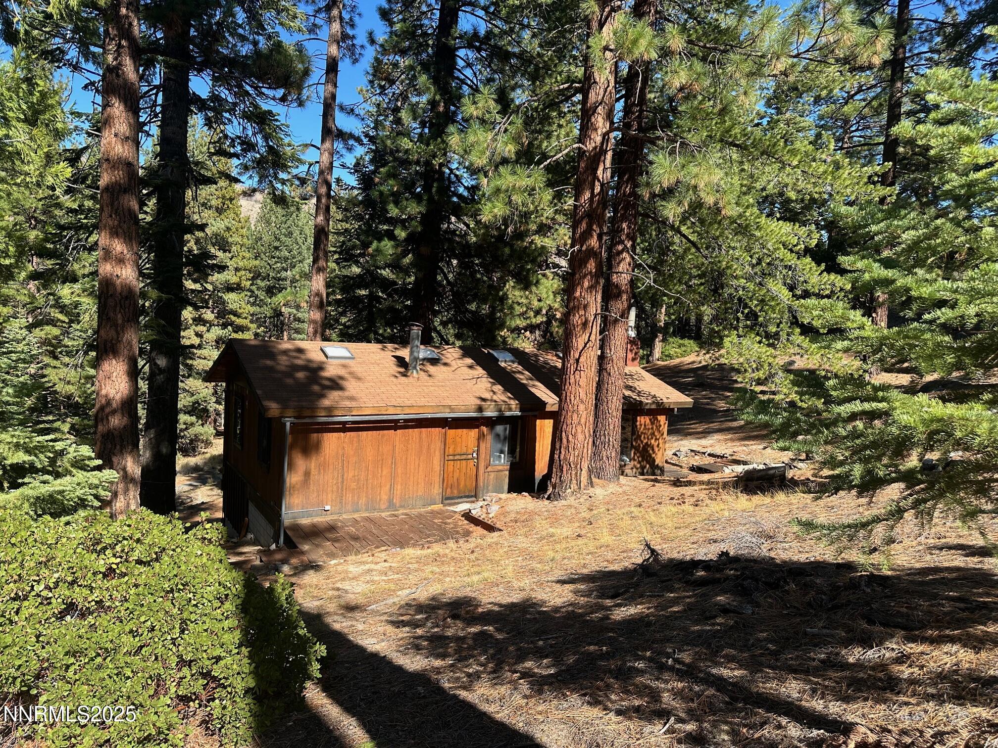 201 Shay Creek Road Markleeville, CA 96120 - Photo 7 of 35 a view of a yard covered with snow in the yard